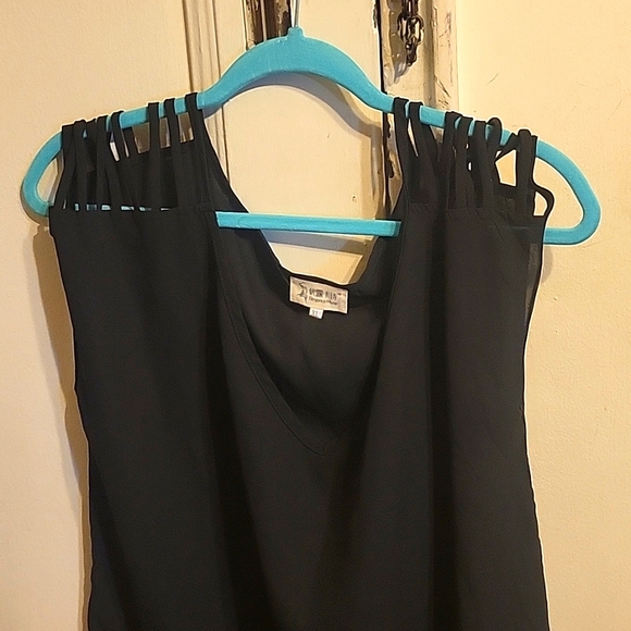 Black top with shoulder fringe. - Picture 1 of 7